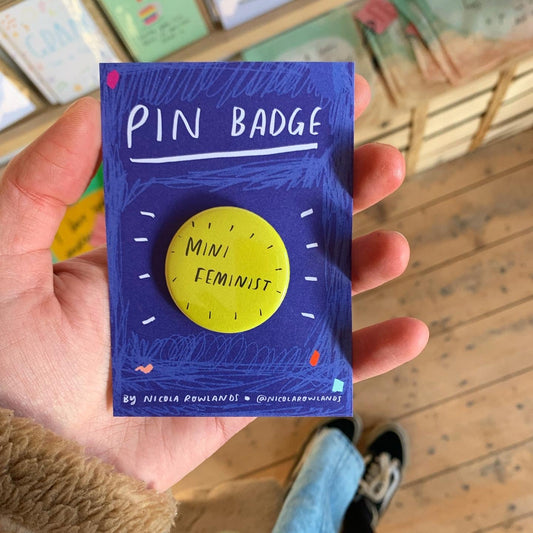 Mini feminist/ in retrograde/ on a journey badge